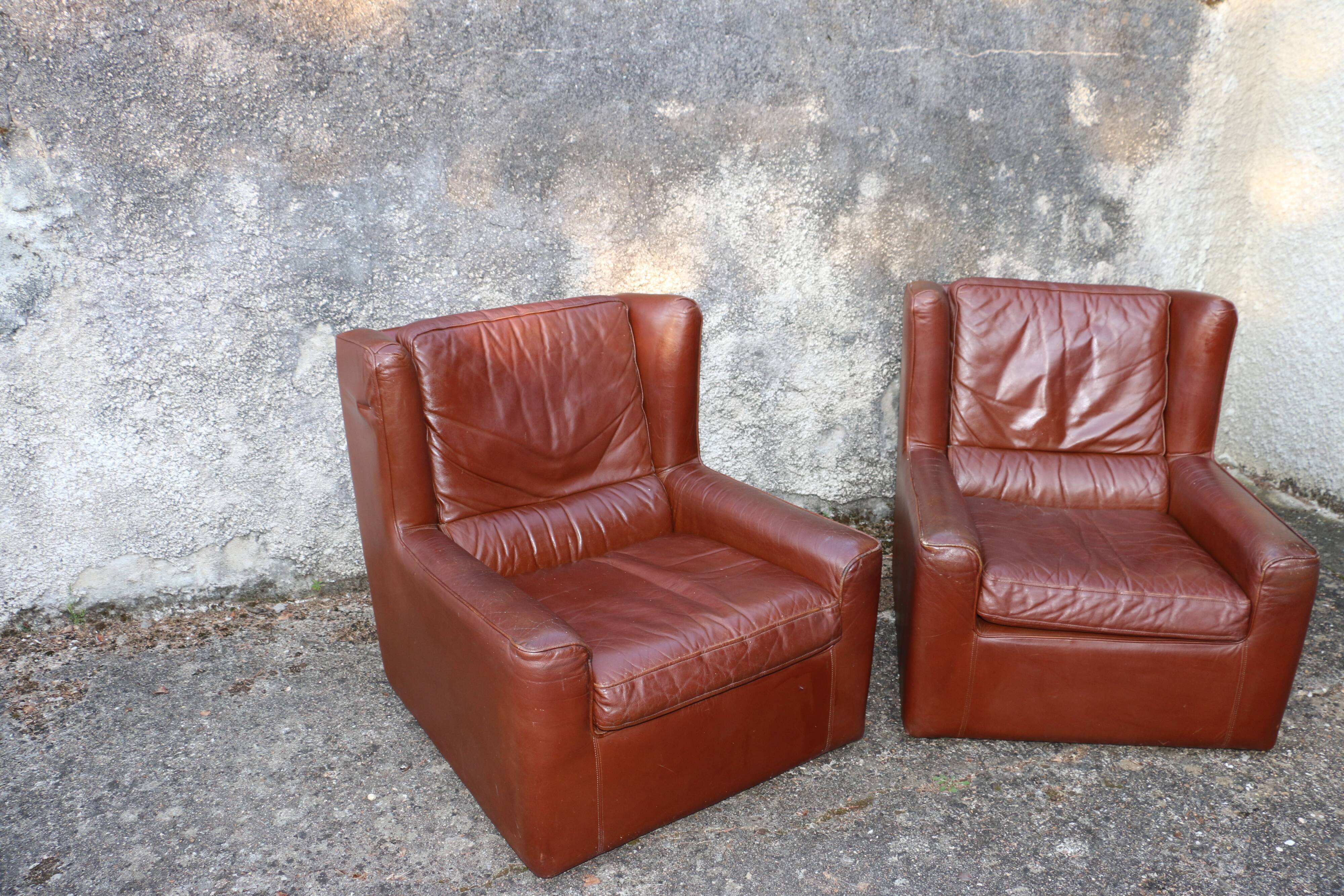 Pair of armchairs with very soft leather ears 80s