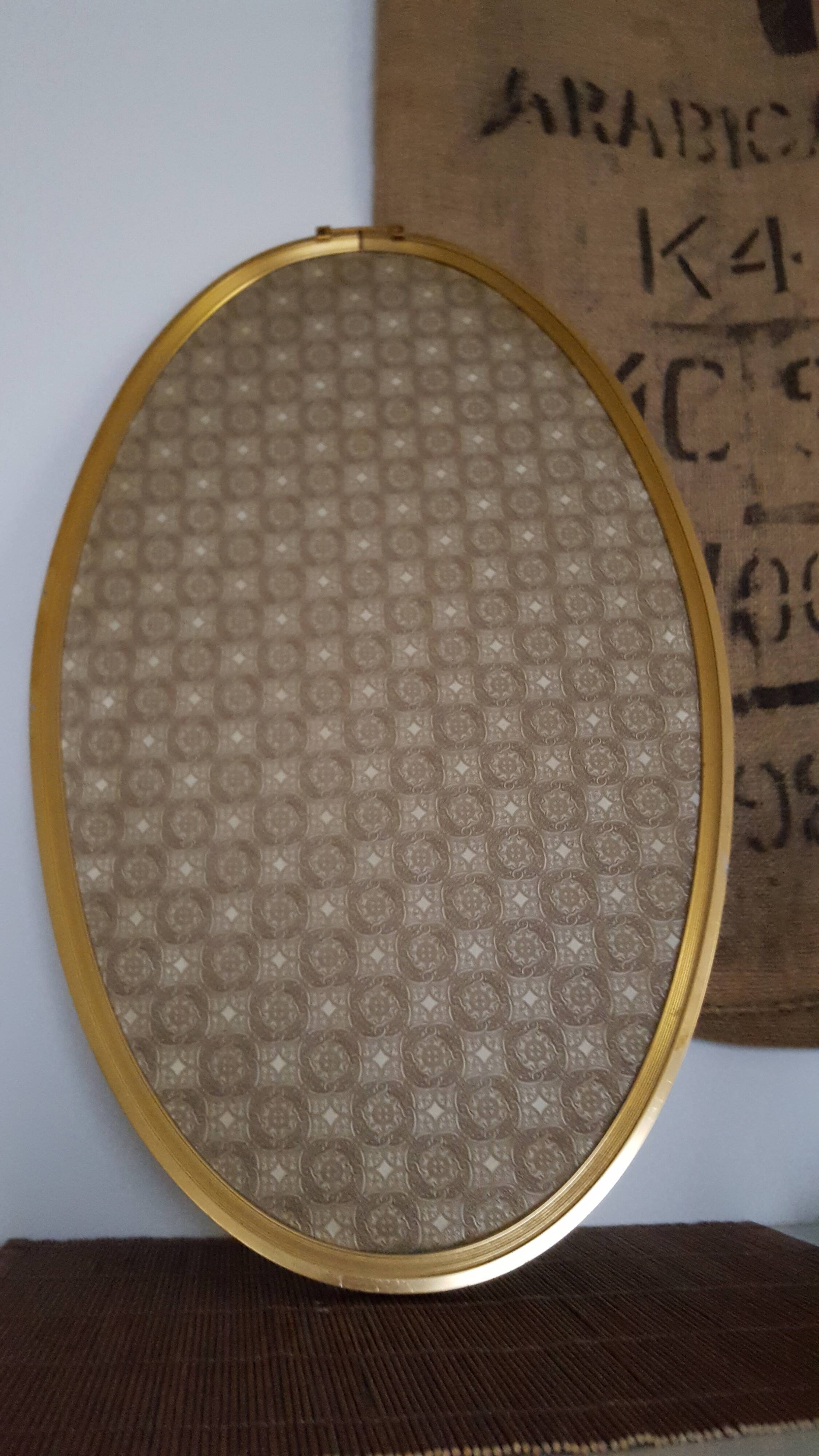 Miroir oval doré 63x37cm