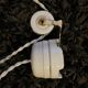 Suspension rises and falls with counterweight in porcelain and opaline