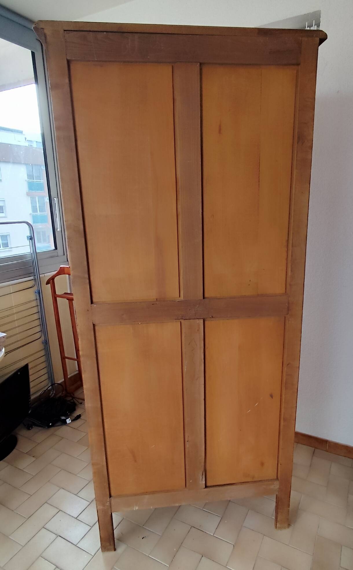 Louis XV rustic bonnetière in solid cherry wood, late 19th to early 20th century.