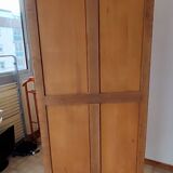 Louis XV rustic bonnetière in solid cherry wood, late 19th to early 20th century.