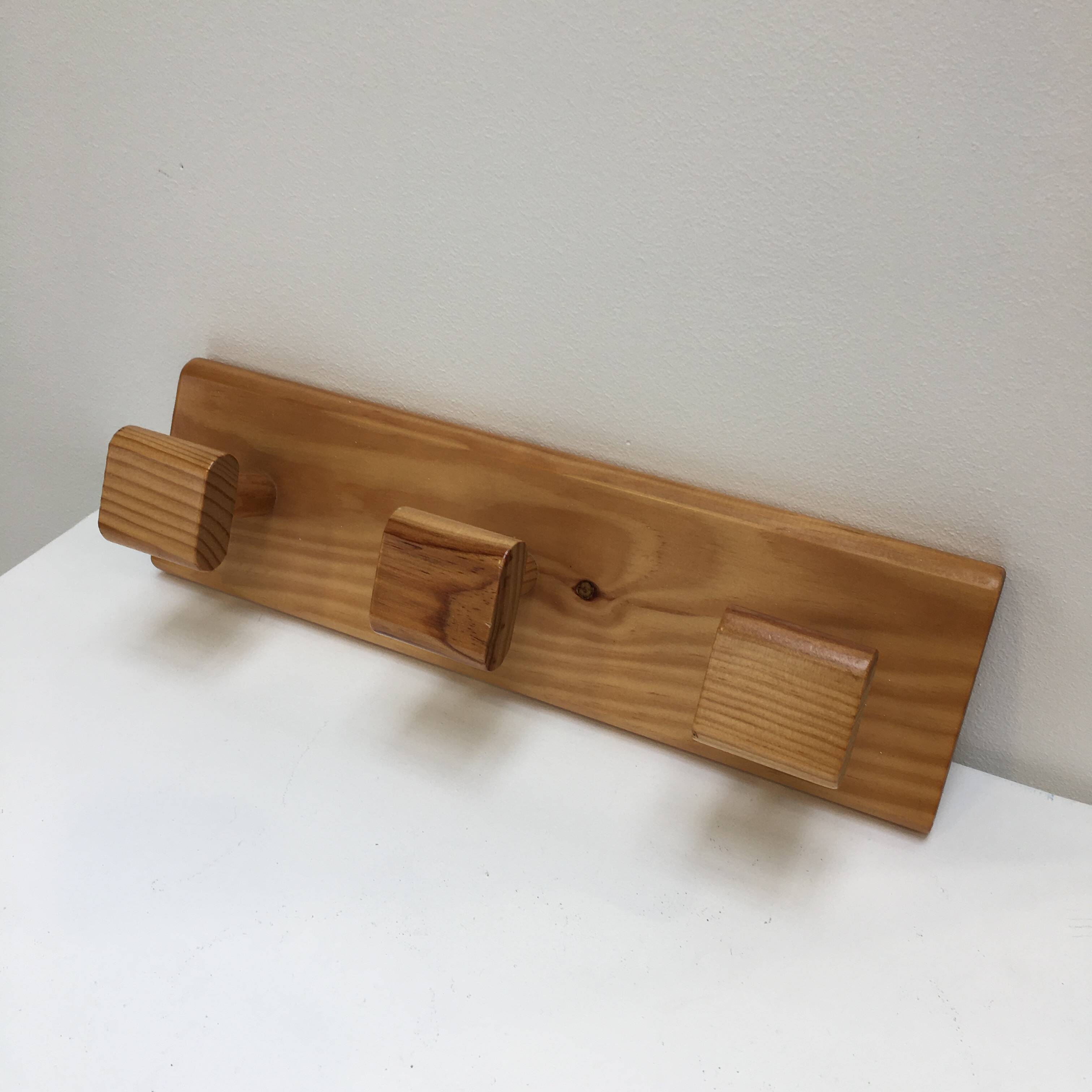 Modernist pine coat rack