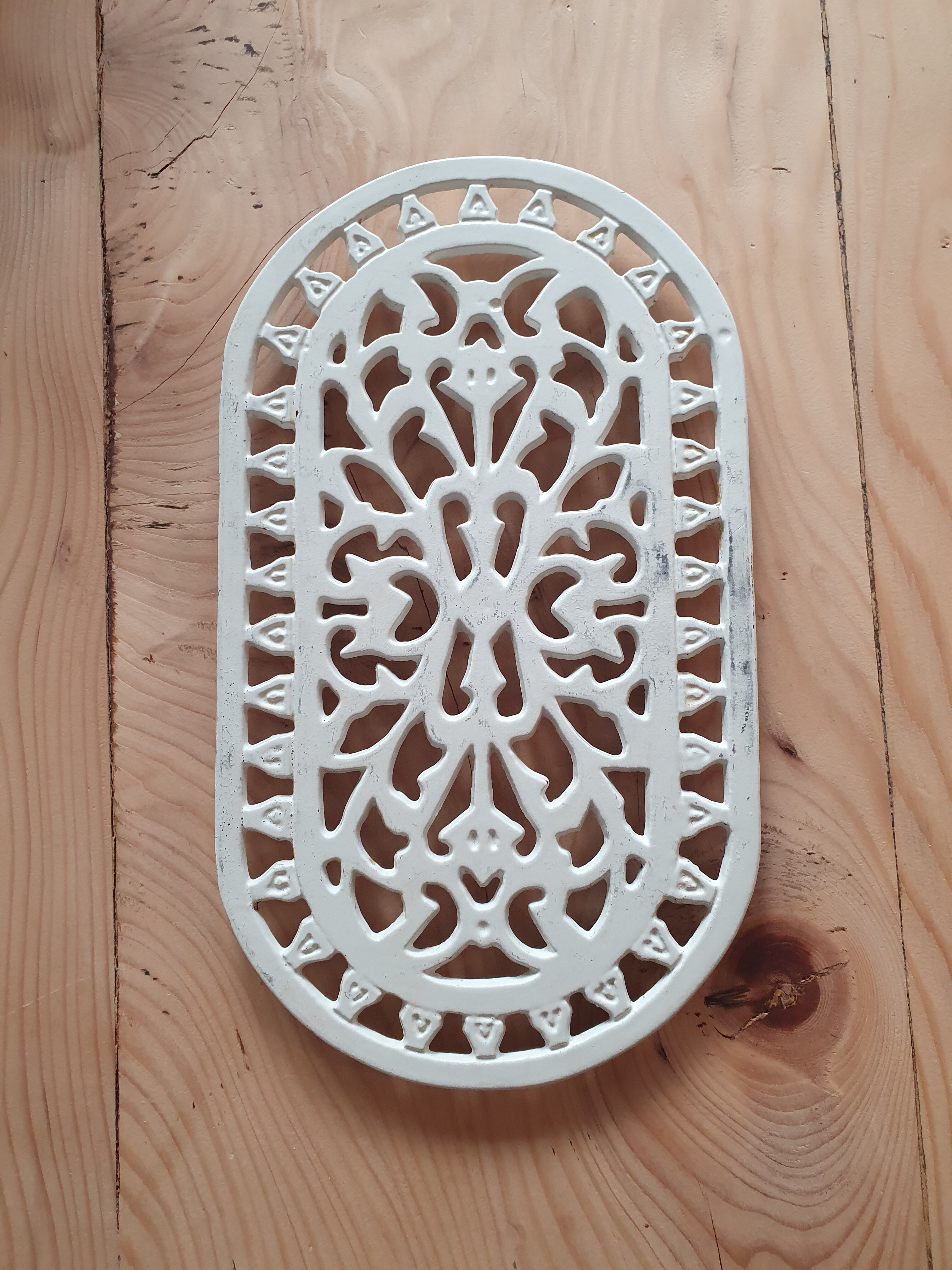 Dessous de plat en fonte