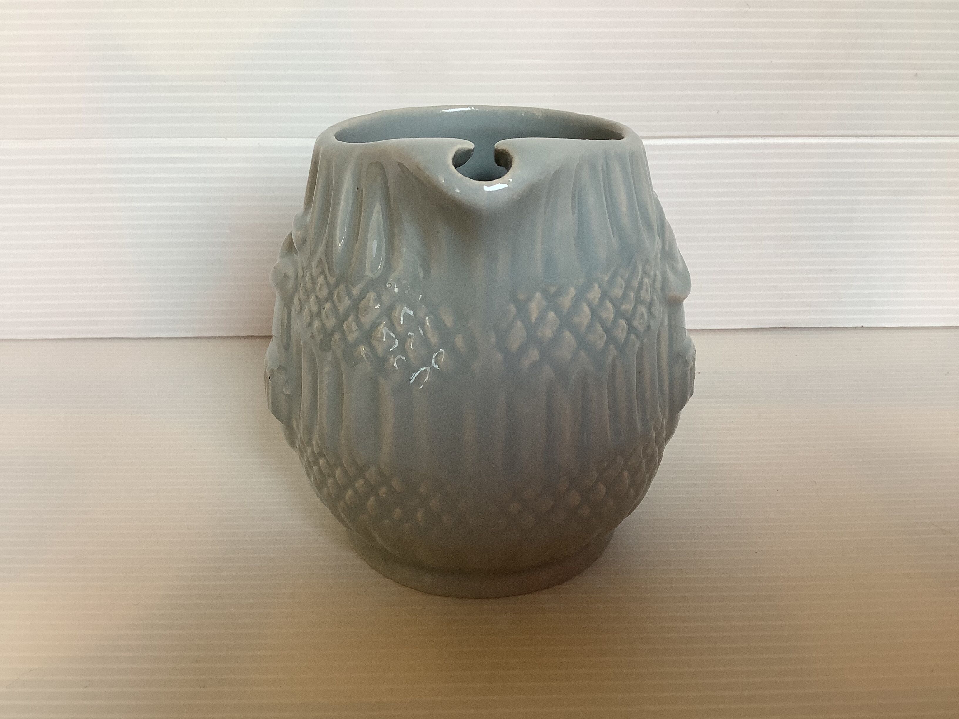 Old grey earthenware Pernod jug