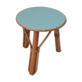Bench, low stool in wood and rattan, tripod, door plants