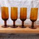 4 vintage aperitif glasses in amber glass