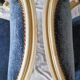 Pair of Louis XVI cabriolet armchairs in cream and blue French elegance late 19th century