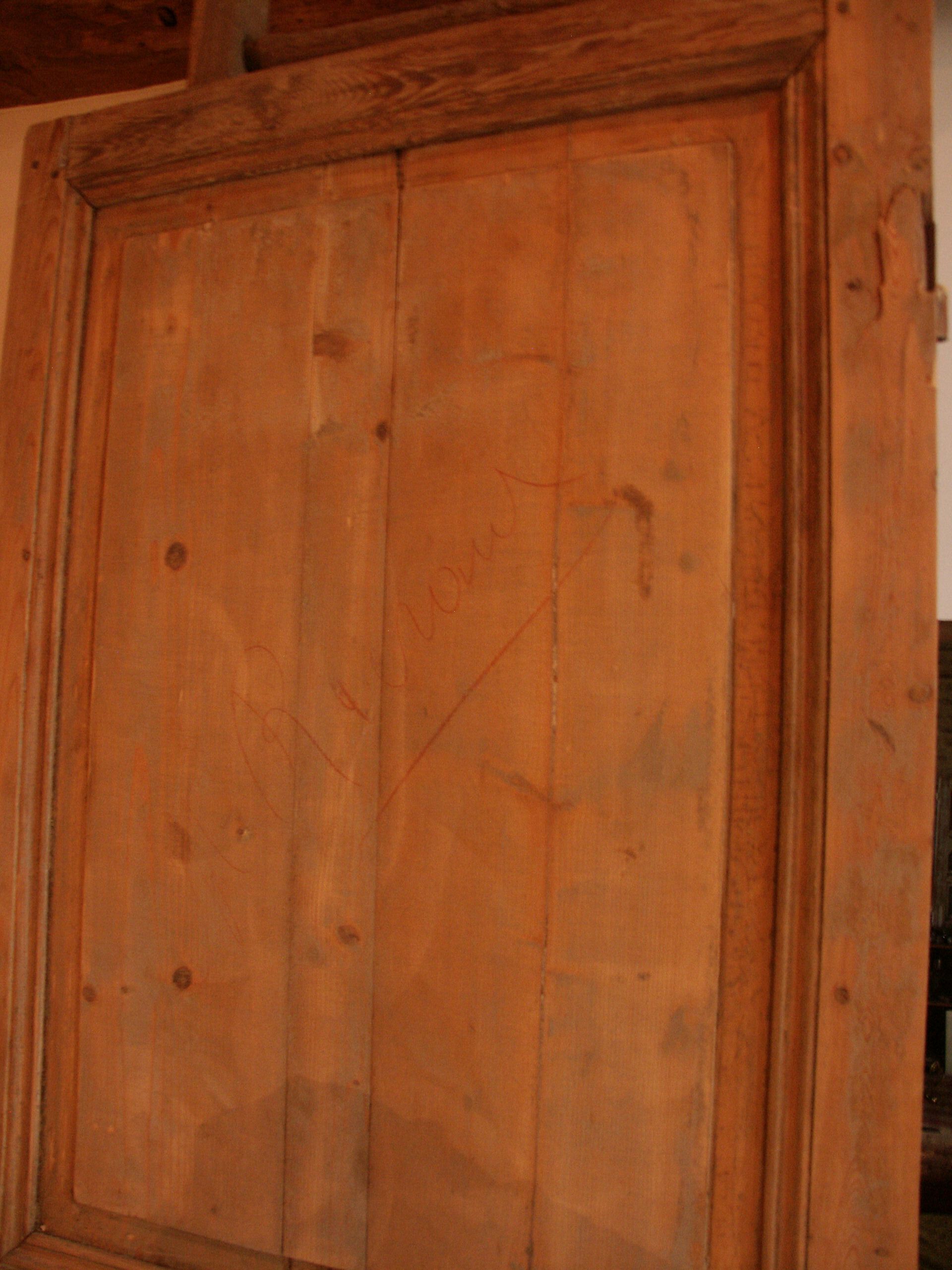 Pine door patinated by time
