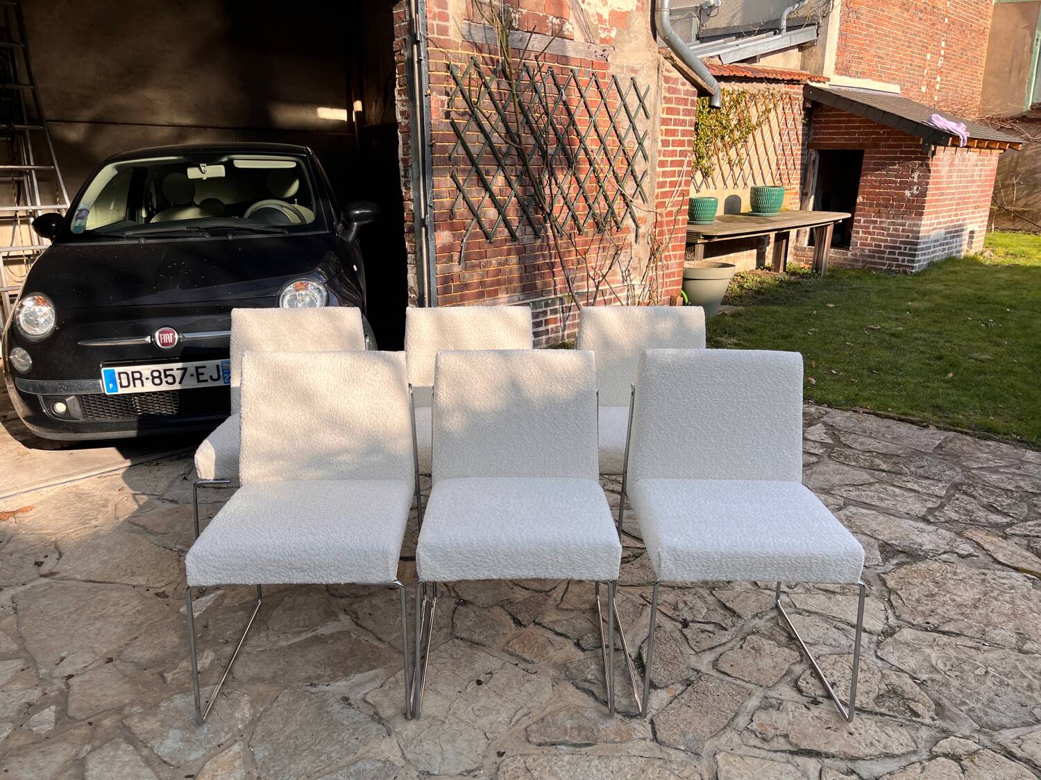 6 Paco Capdell chairs in metal and boucle fabric.