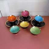 set of 9 black and gold Salins cups and saucers