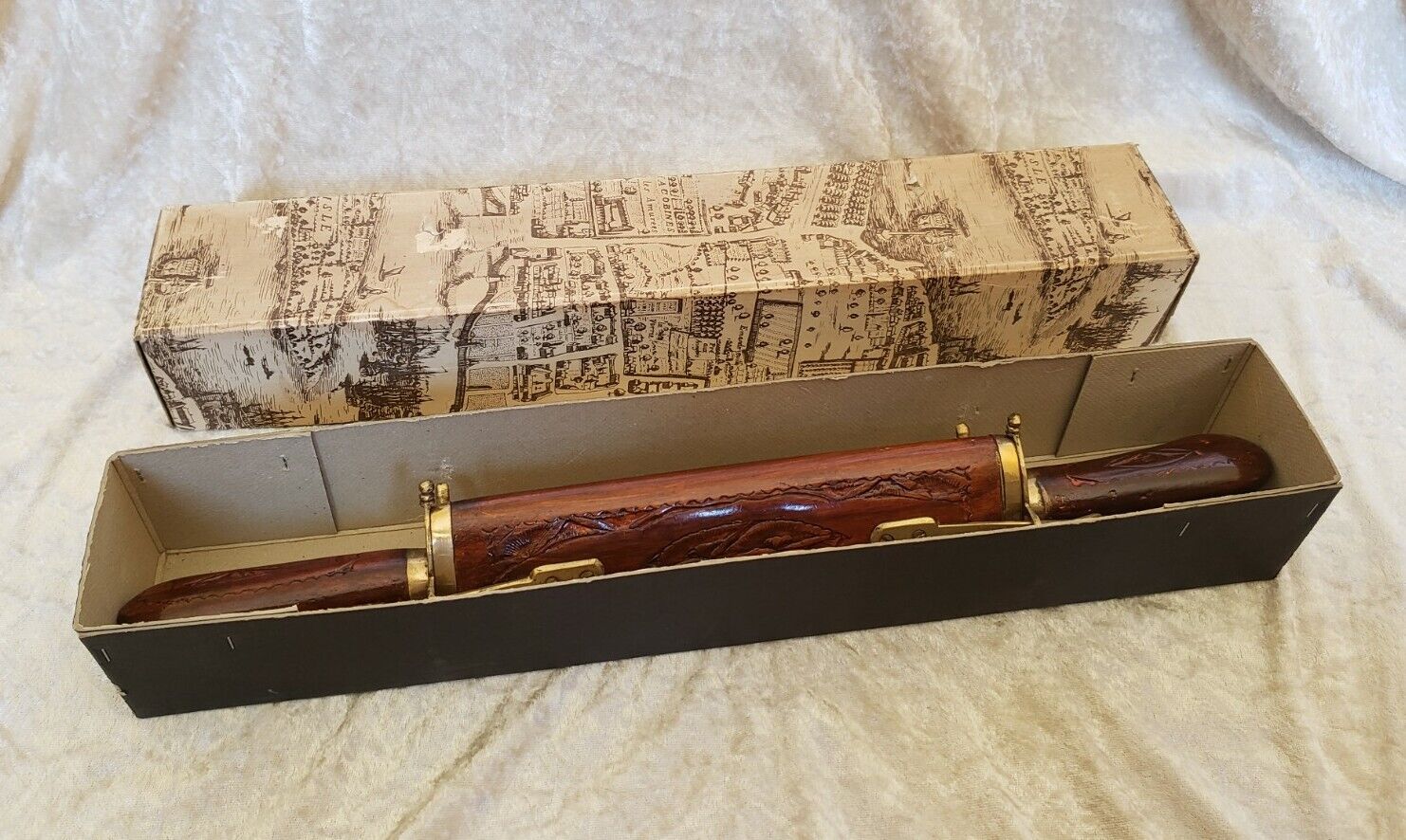 Vintage cutting service with knife and fork in wooden sheath