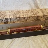 Vintage cutting service with knife and fork in wooden sheath