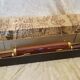 Vintage cutting service with knife and fork in wooden sheath