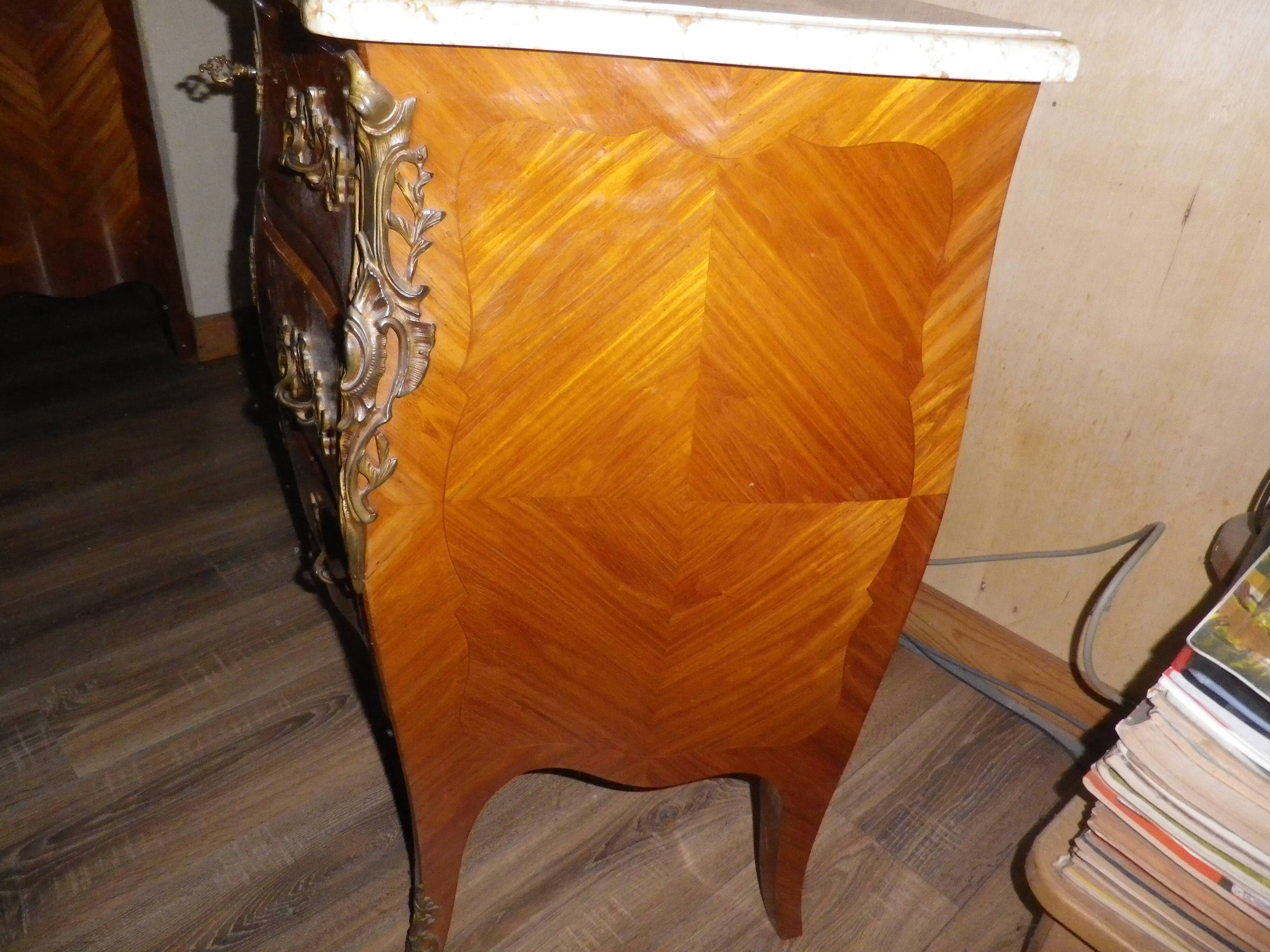 Louis XV style inlaid chest of drawers