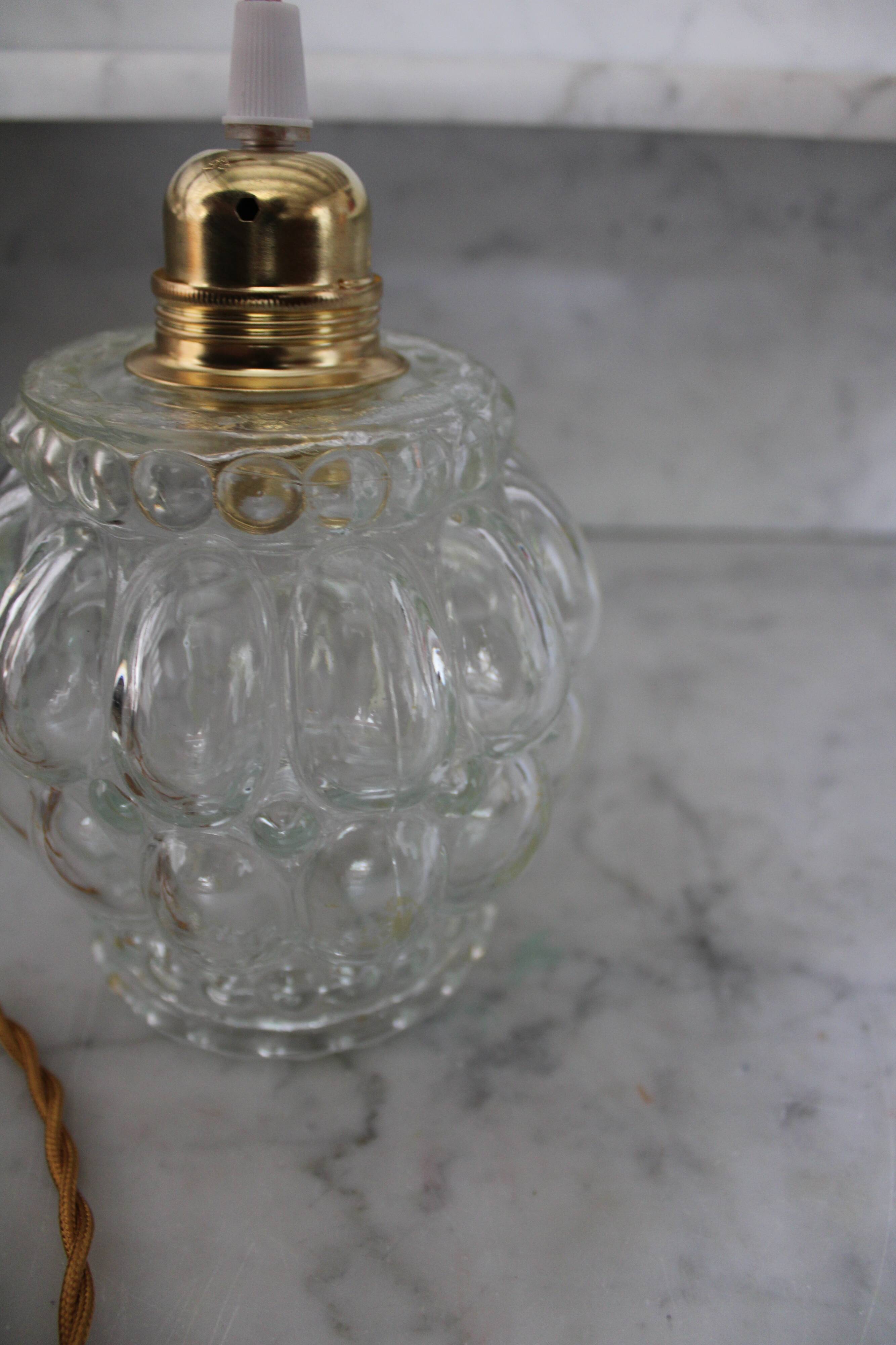 Moulded glass hand lamp