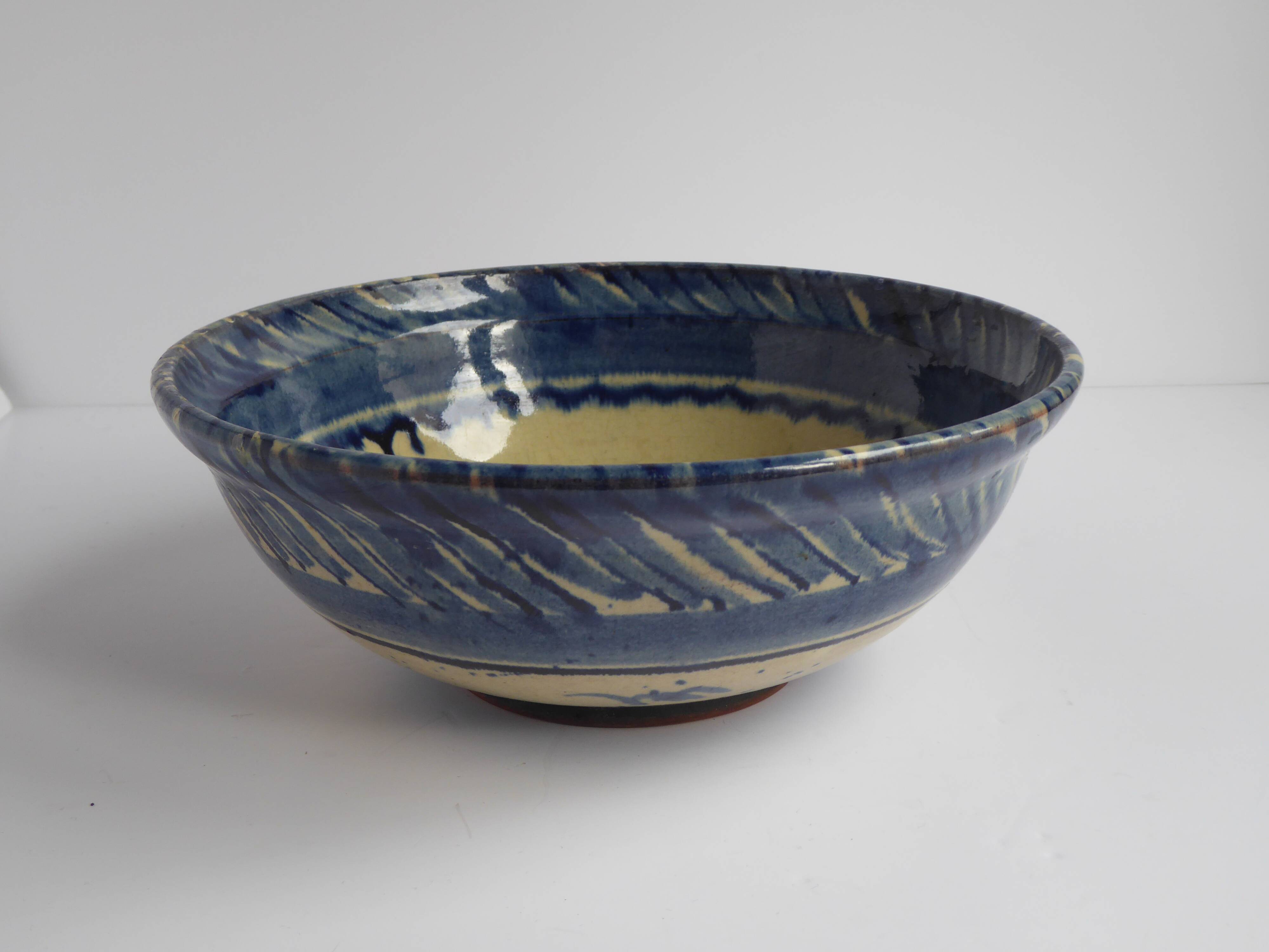 Blue enamelled terracotta cup