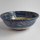 Blue enamelled terracotta cup