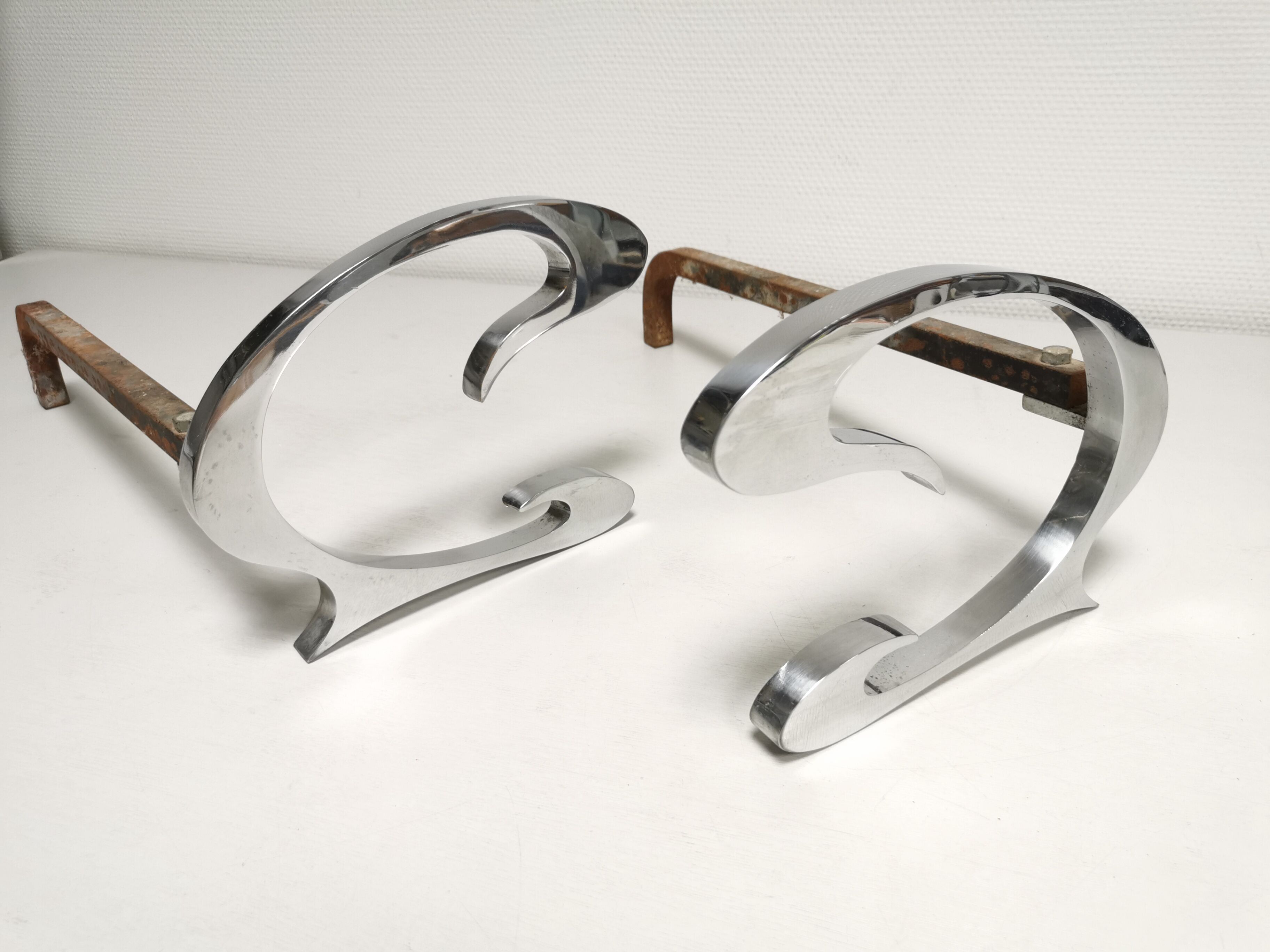 Pair of andirons in brushed steel and metal edition Jean-Paul Créations circa 1970