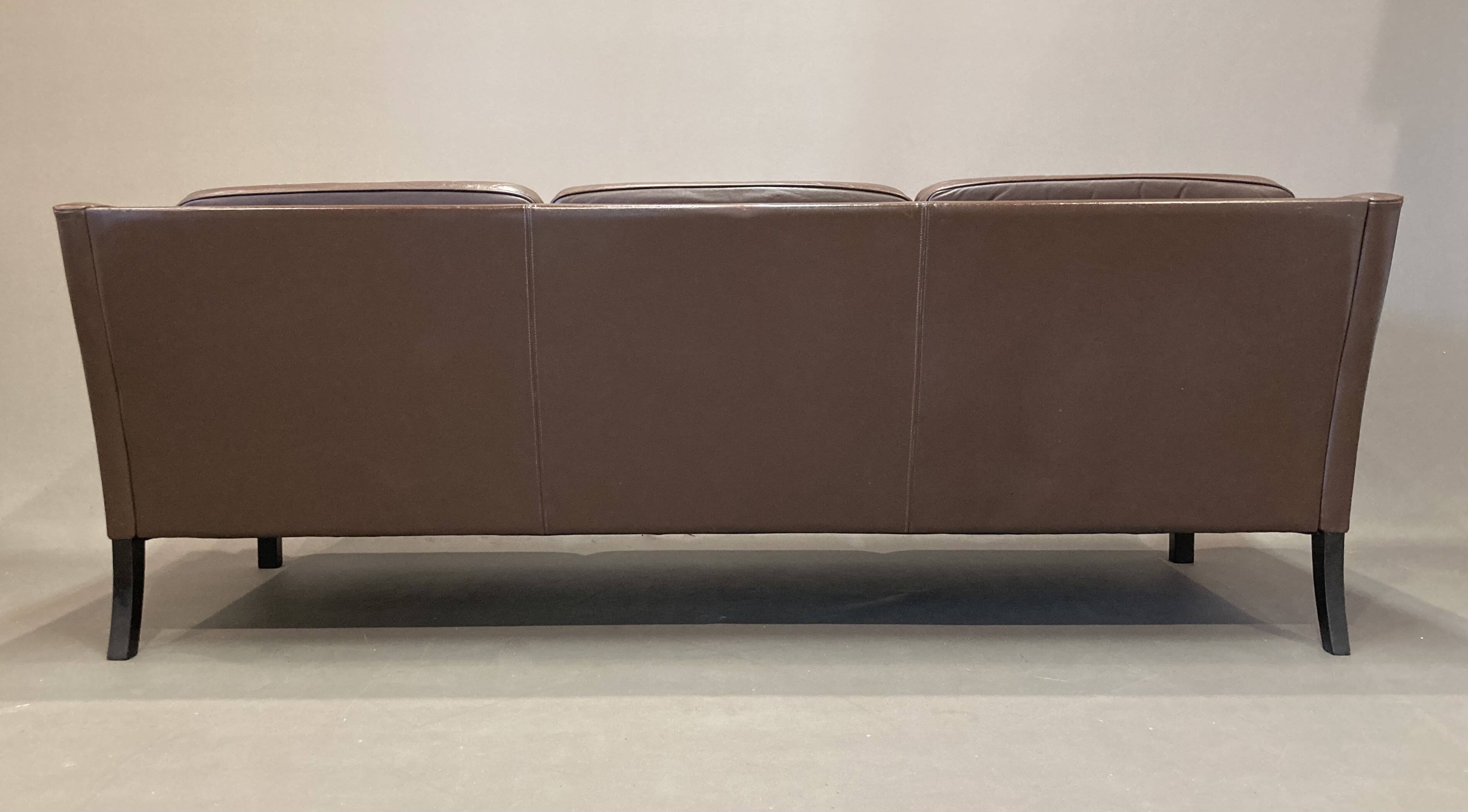 Scandinavian design 3-seater leather sofa.