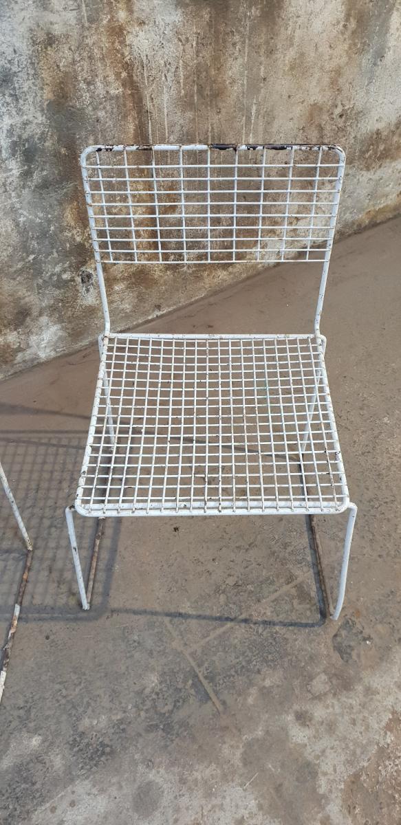 Two vintage metal chairs