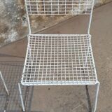 Two vintage metal chairs