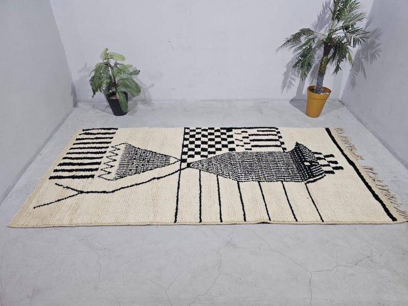 Handmade pure wool rug in black and white, size 150 x 250 cm.