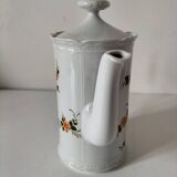Vintage coffee pot Winterling Bavaria with orange floral decoration.
