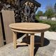Round solid oak table with extensions, maximum 220cm.