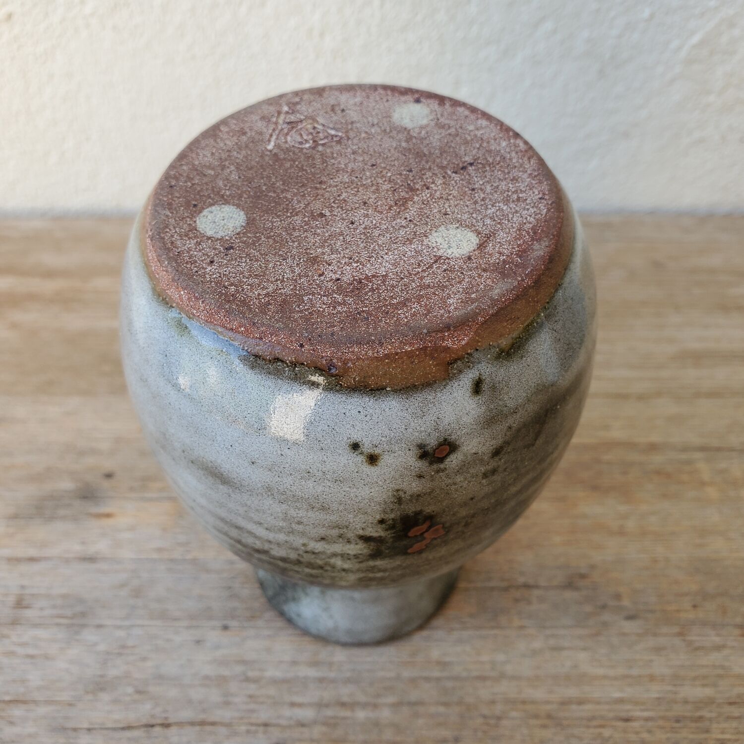Signed sandstone vase