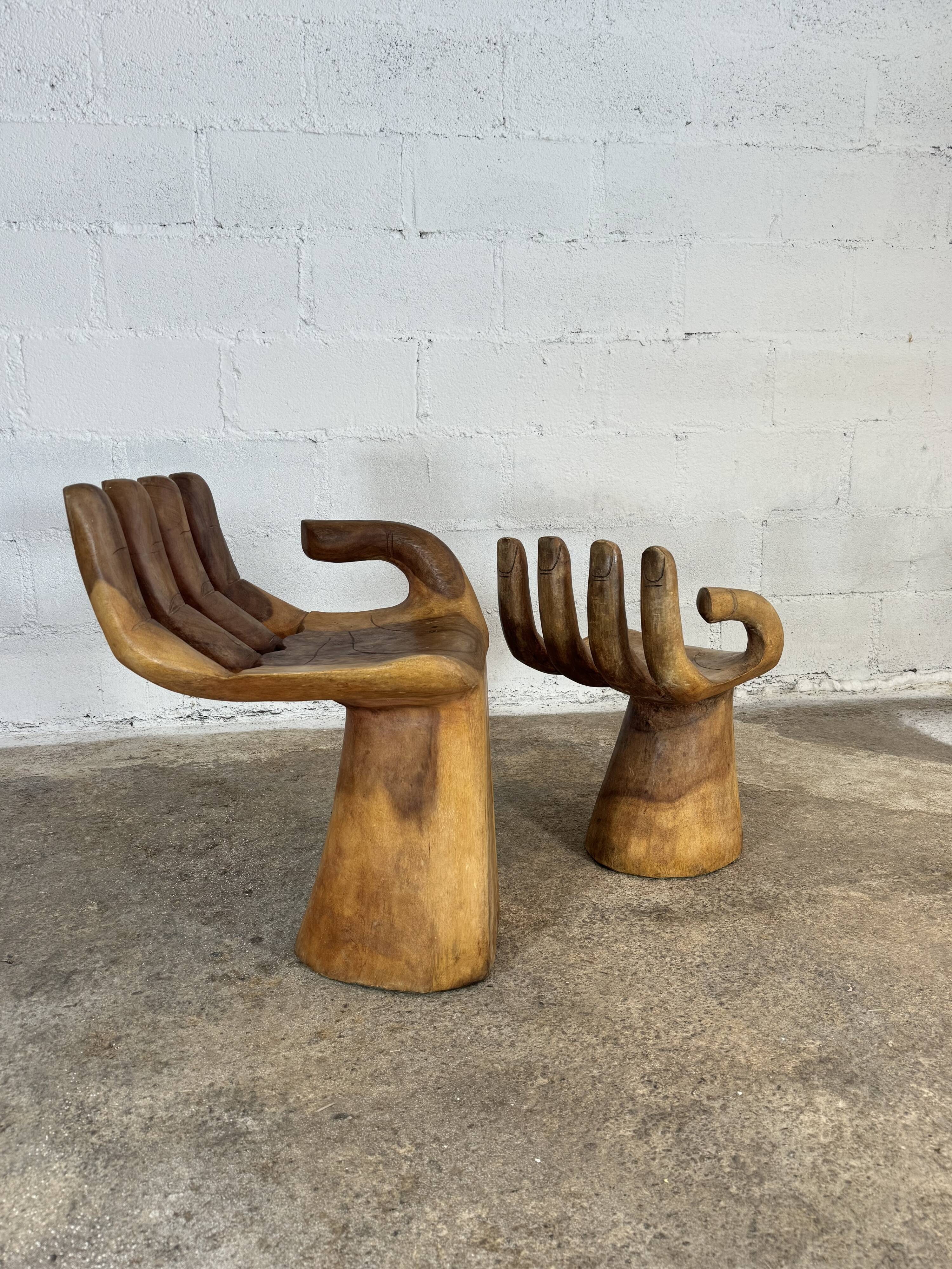 Hand carved chairs in the Pedro Fiedeberg style