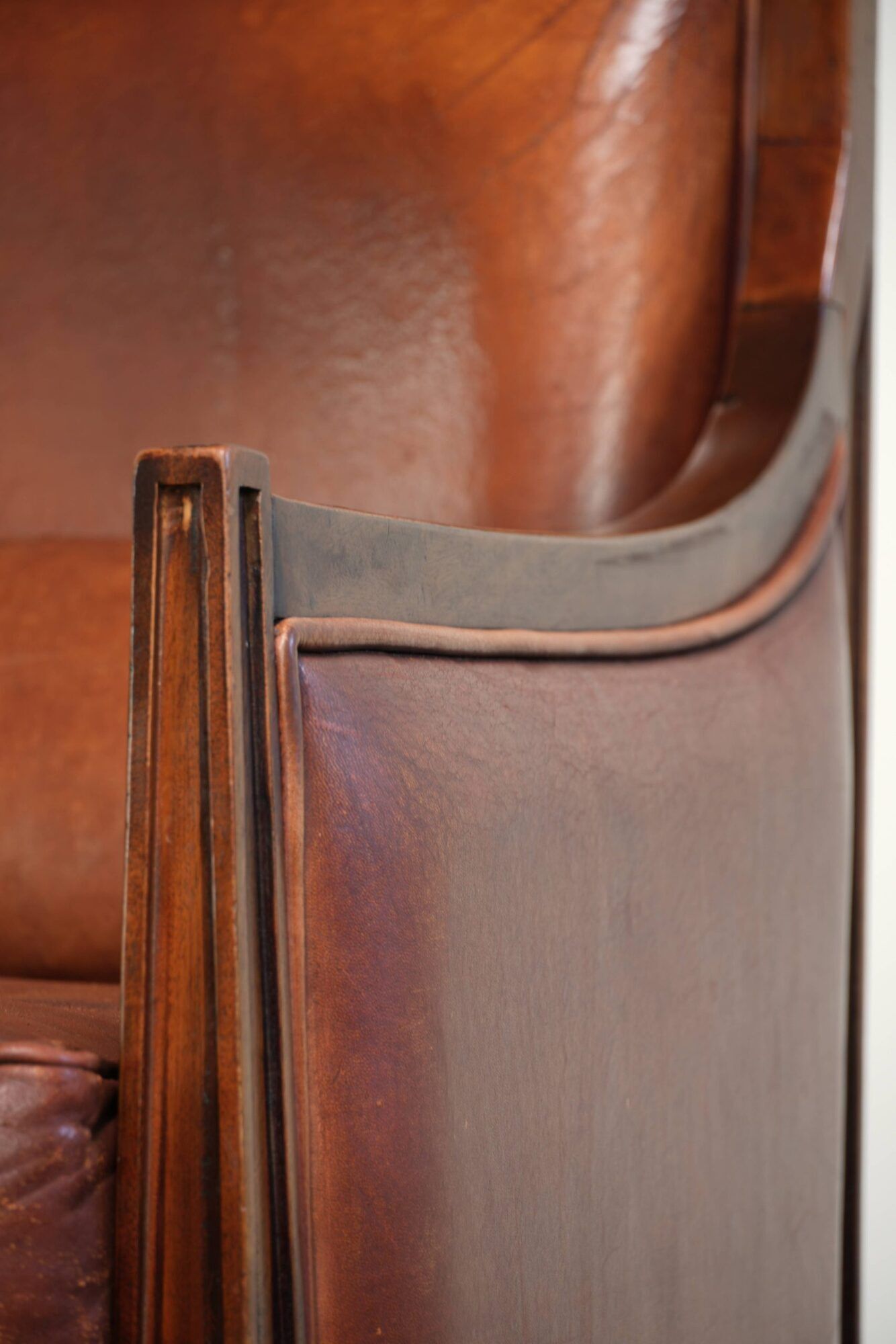 Sheepskin Art Deco design armchair with a comfortable seat and warm colours