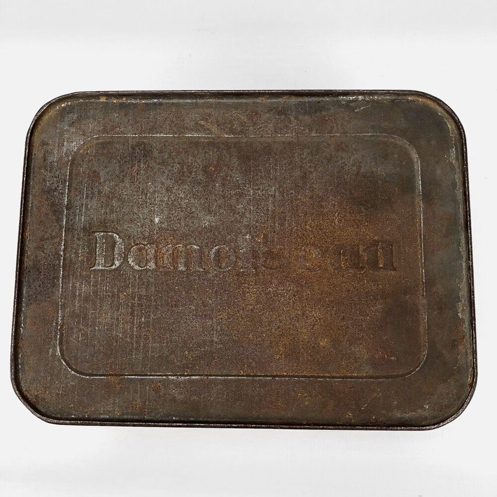 Antique lithographed tin biscuit tins