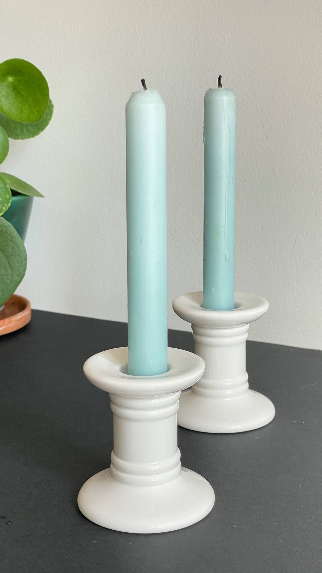 Pair of White Ceramic Candlesticks