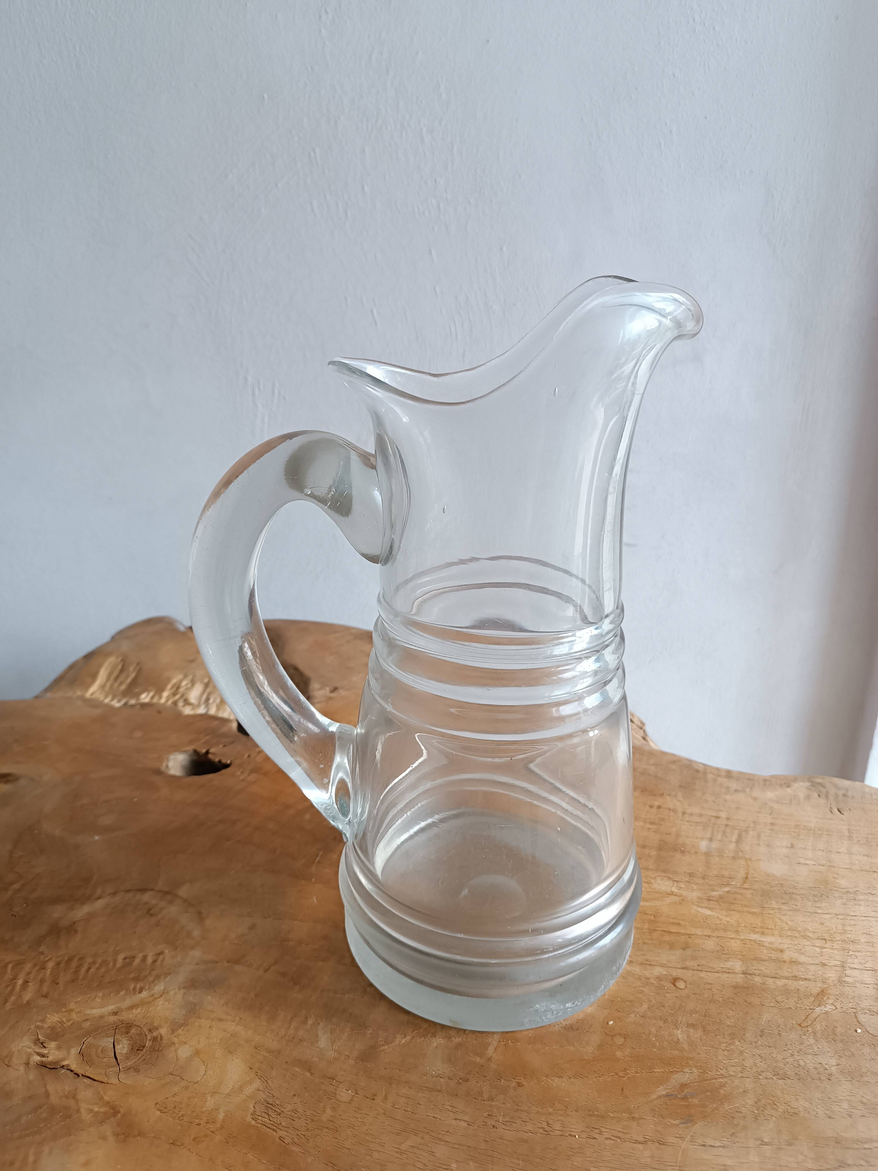 Large Normandy cider pitcher in blown glass, 19th century