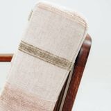 Fauteuil vintage avec coussins en tissu naturel rayé