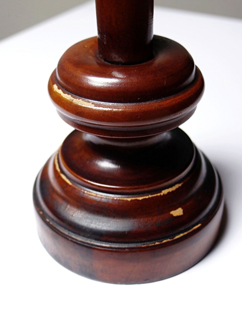 Antique wooden altar crucifix with a turned design and silver-plated Christ.