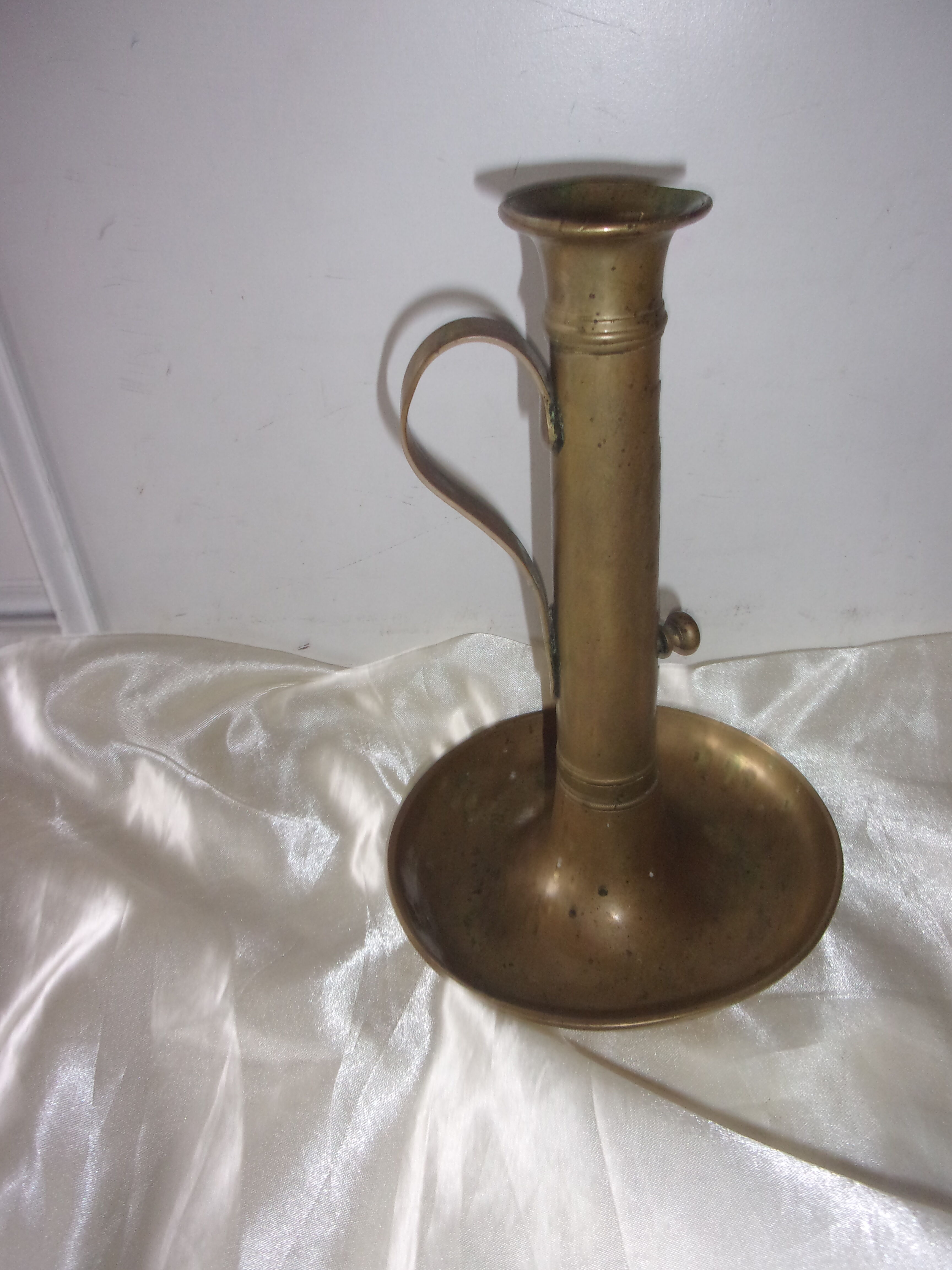 Brass pusher candle holder