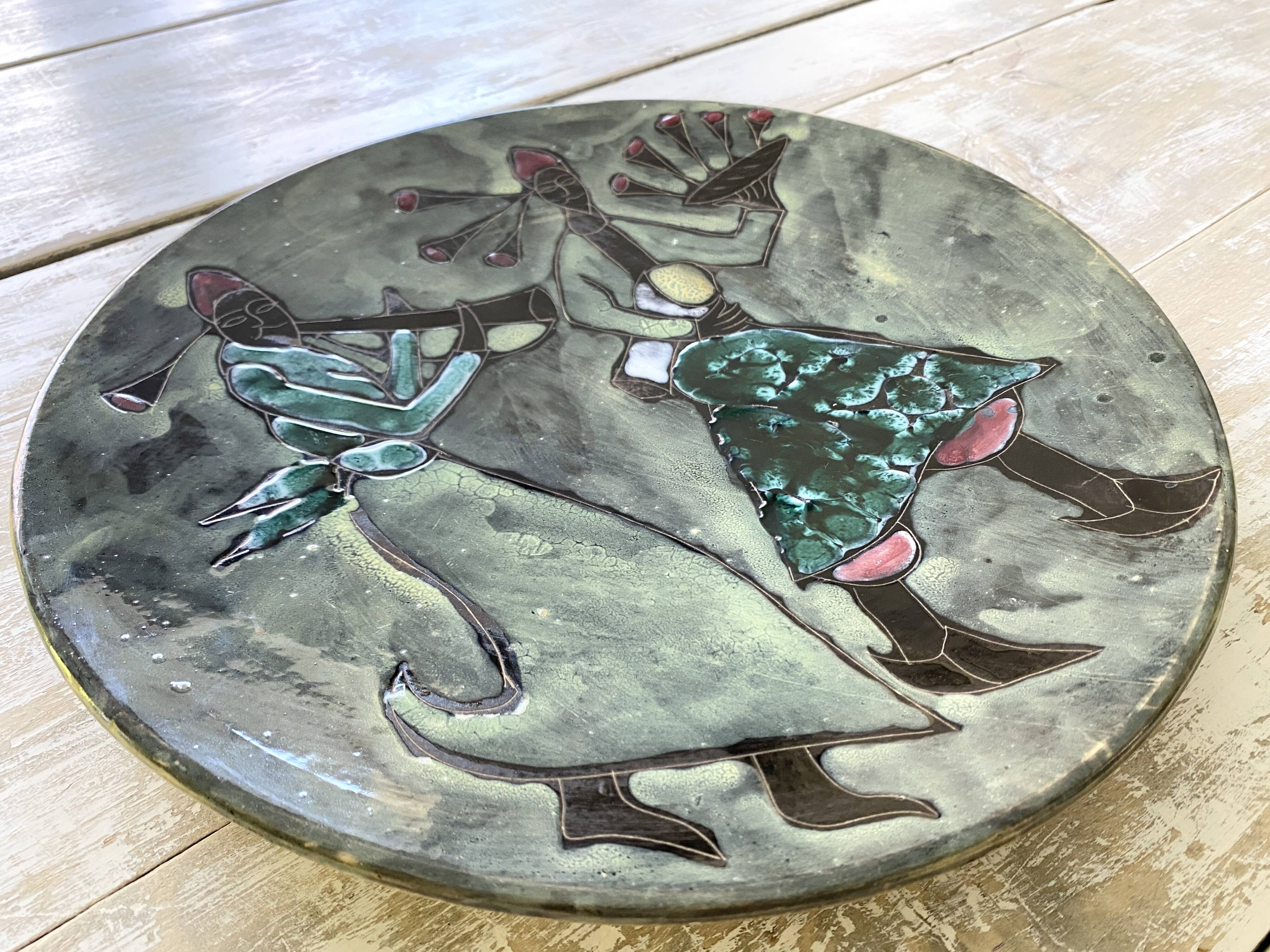Musicians ceramic dish, signed