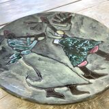 Musicians ceramic dish, signed