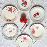 Old mismatched earthenware dinner plates