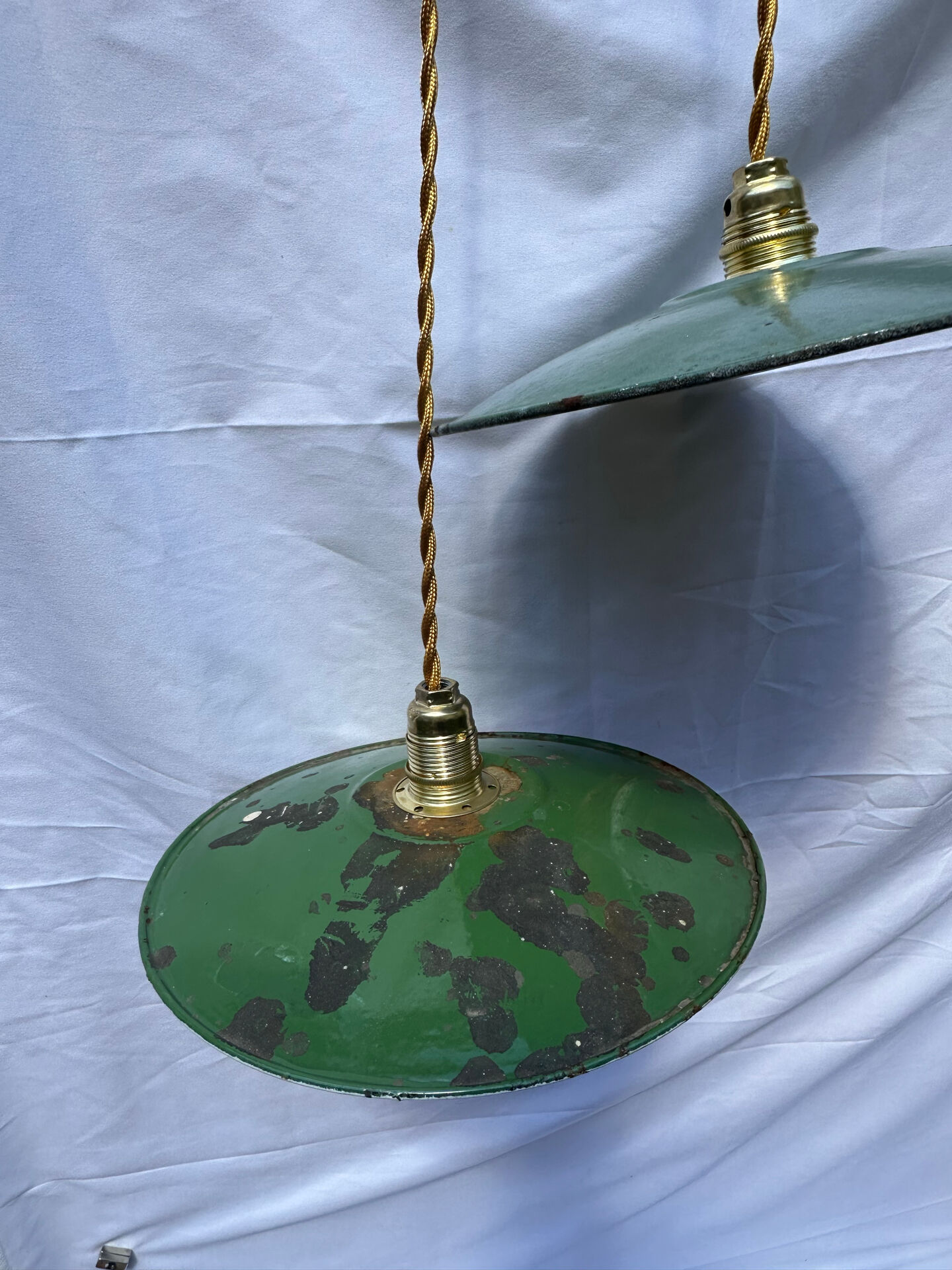 Old suspension pair in green and white enamelled sheet metal.