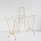 Vintage magazine holder in gold metal