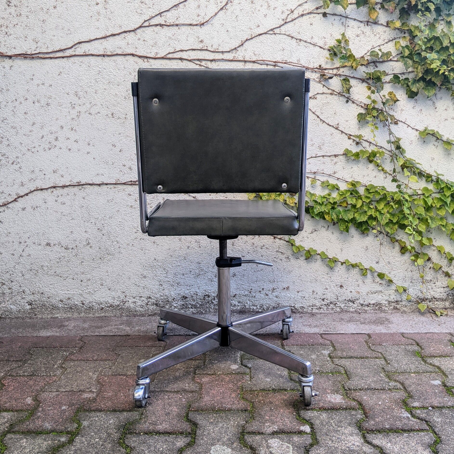 Swivel office chair on wheels 70s