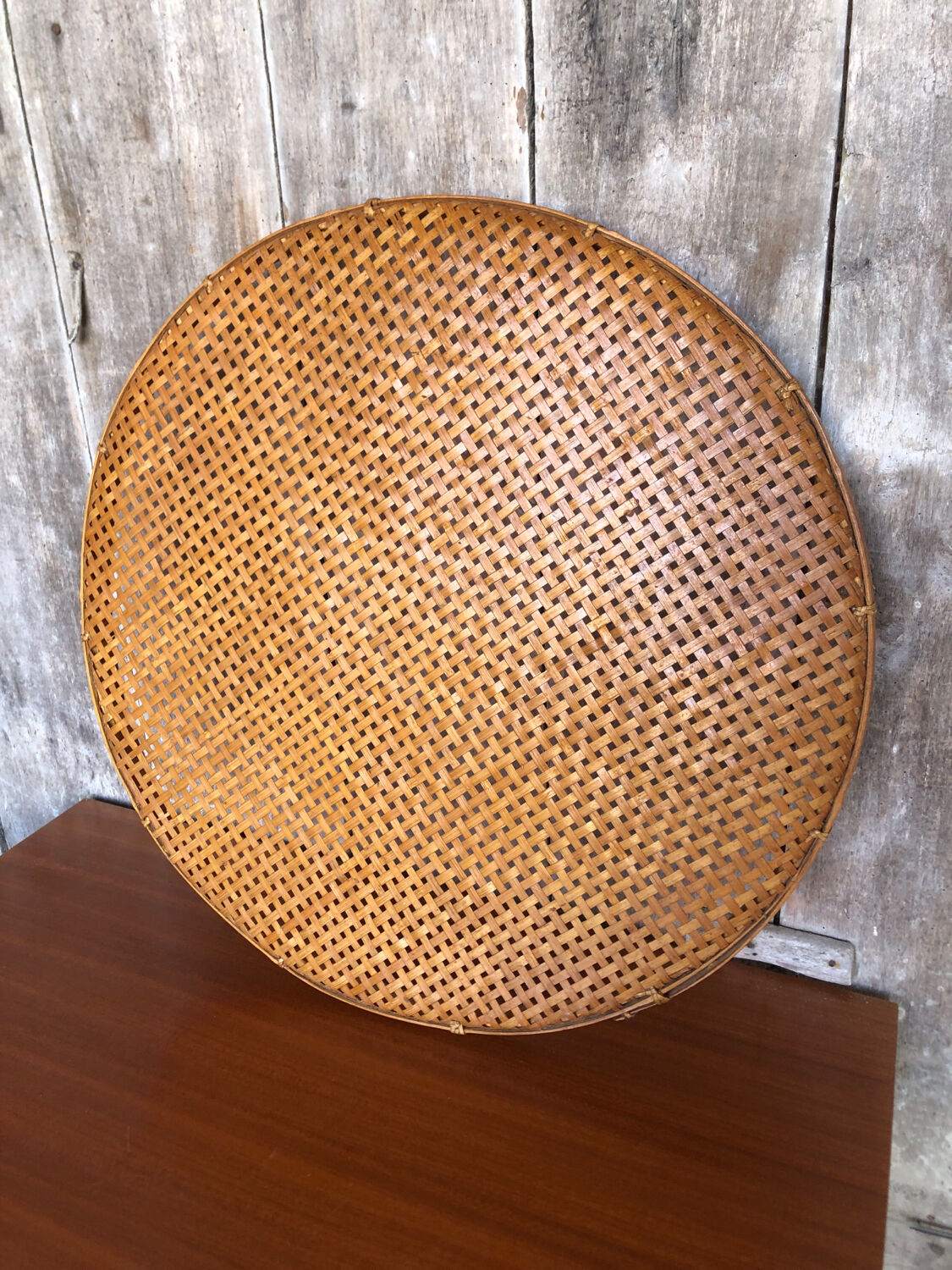 Old vintage braided wicker sieve