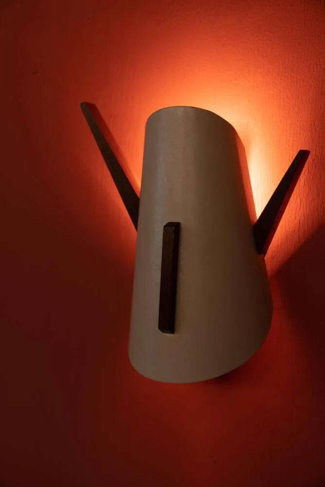 Vintage wall lamp from the 60s, teak and mid-century metal.