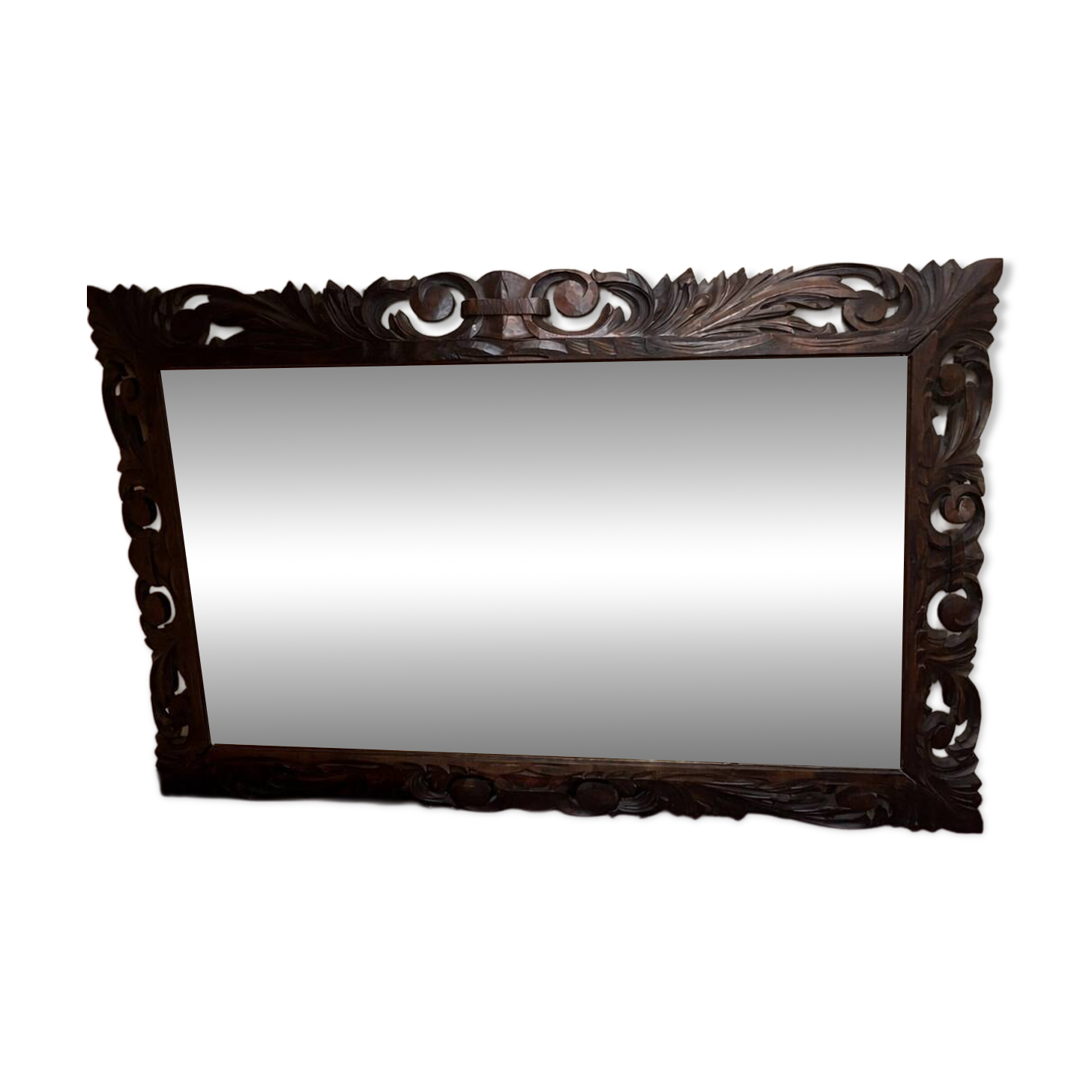 Antique mirror in carved wood