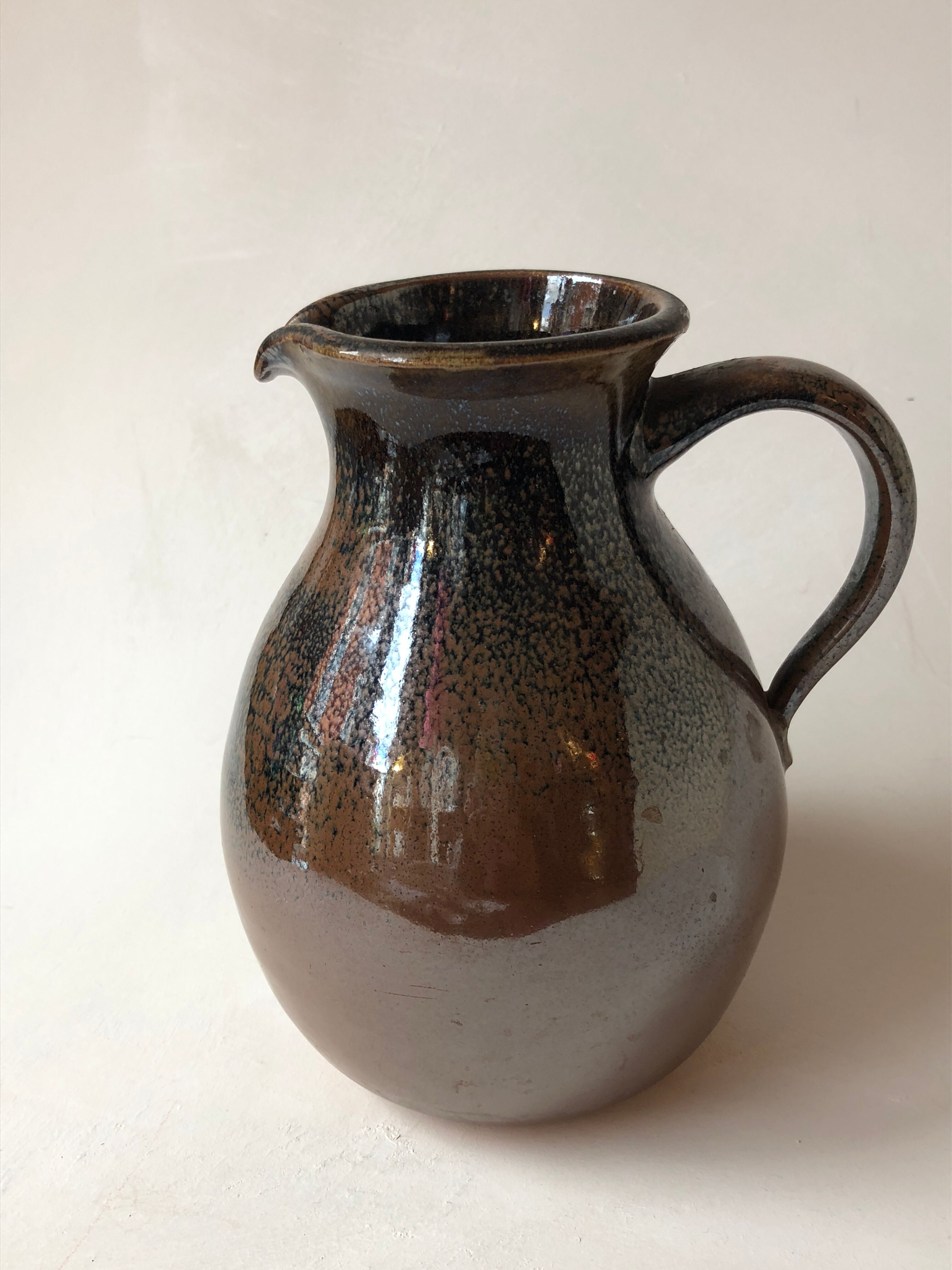 Glazed stoneware jug signed "KD".