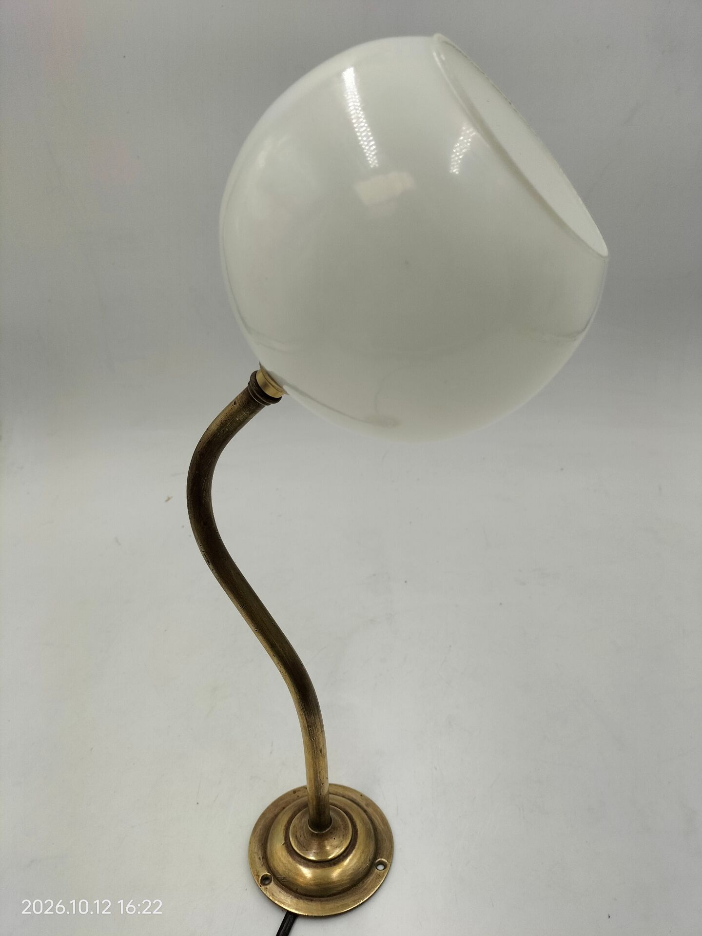 Brass and glass wall light