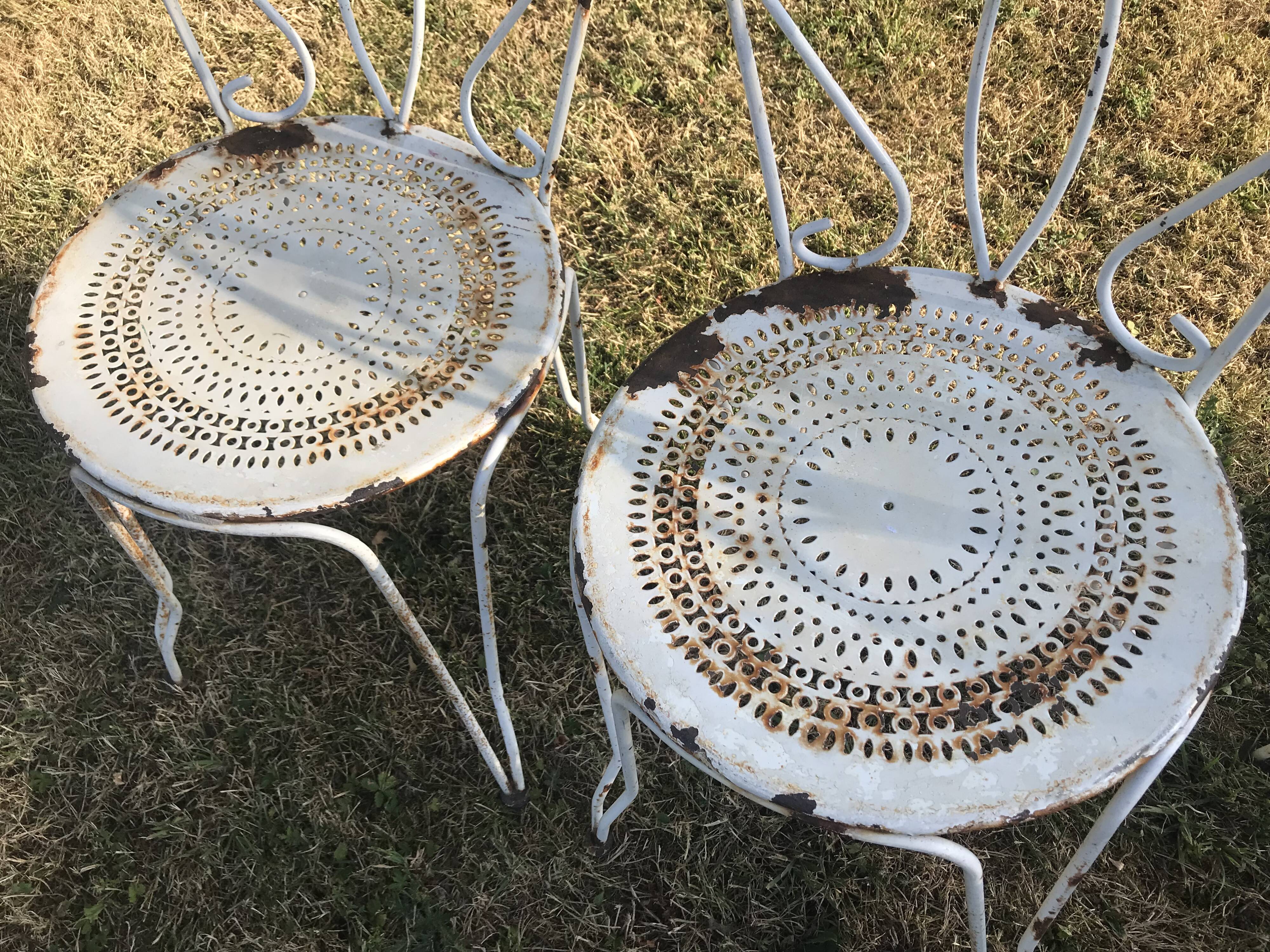 4 wrought iron garden chairs