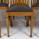 Set of 6 Art Nouveau chairs and armchairs in oak and leather.
